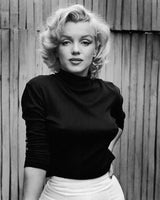 MARILYN MONROE ON PATIO OF HER HOME