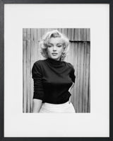 MARILYN MONROE ON PATIO OF HER HOME